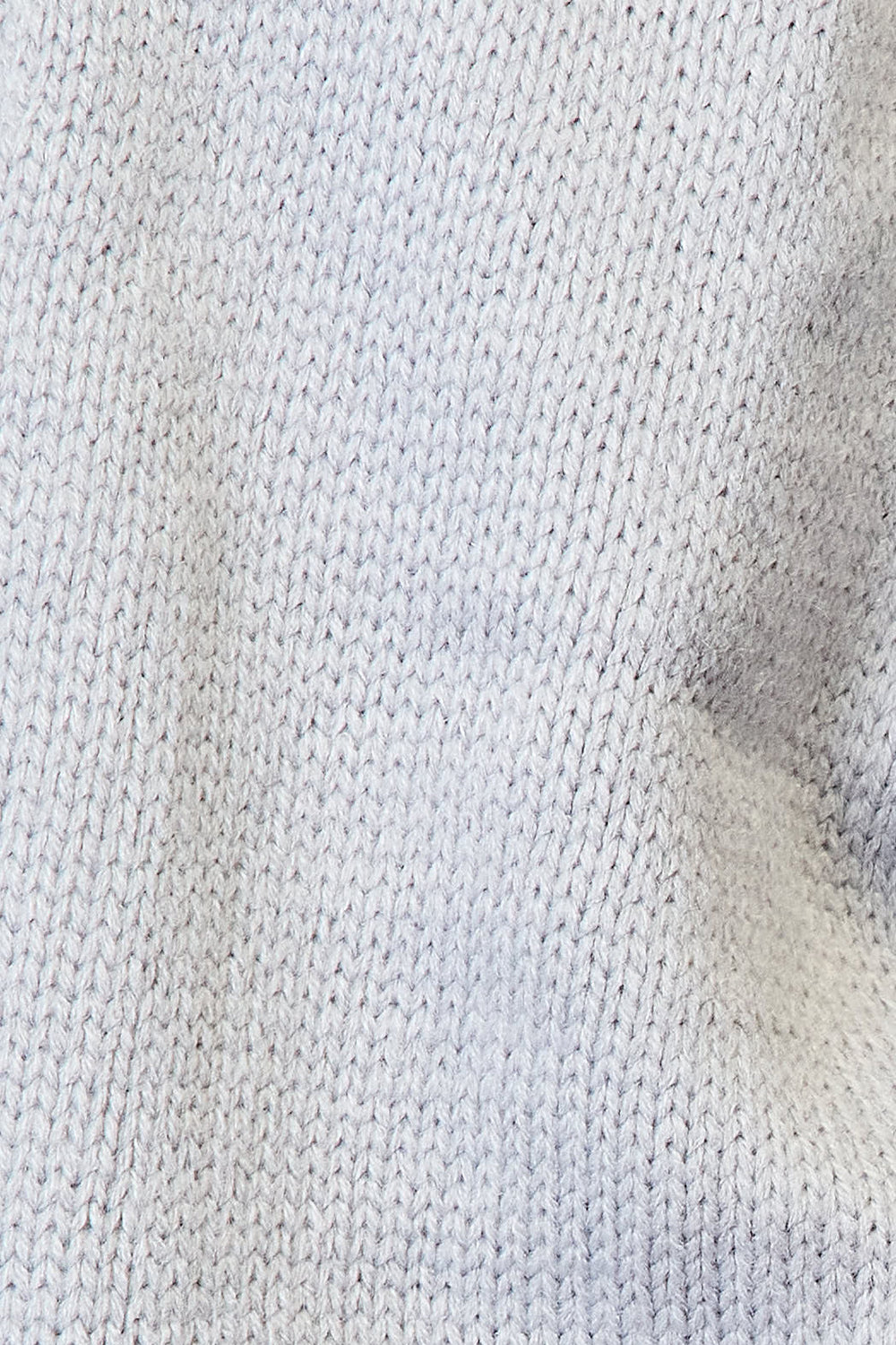 Close-up of a gray, knit fabric texture. The Angel Wings Multicolored Stripe Open Front Longline Cardigan showcases a fashionable layering piece with its soft and densely woven texture, featuring detailed stitches and an even, consistent pattern throughout.