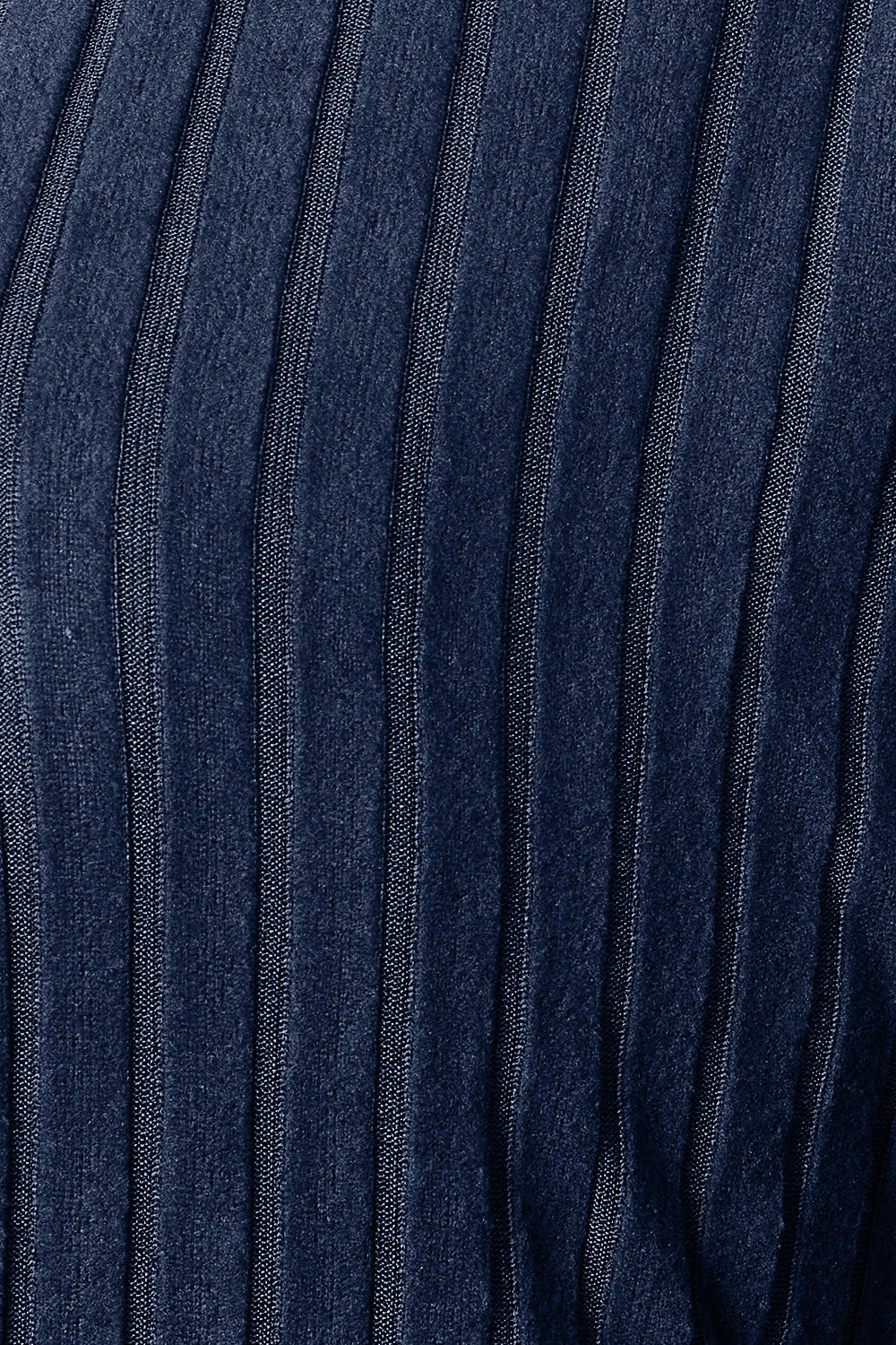 Close-up of a slightly stretchy polyester fabric from the Basic Bae Full Size Ribbed Cocoon Cardigan, featuring textured vertical ridges in alternating dark blue and light blue tones.