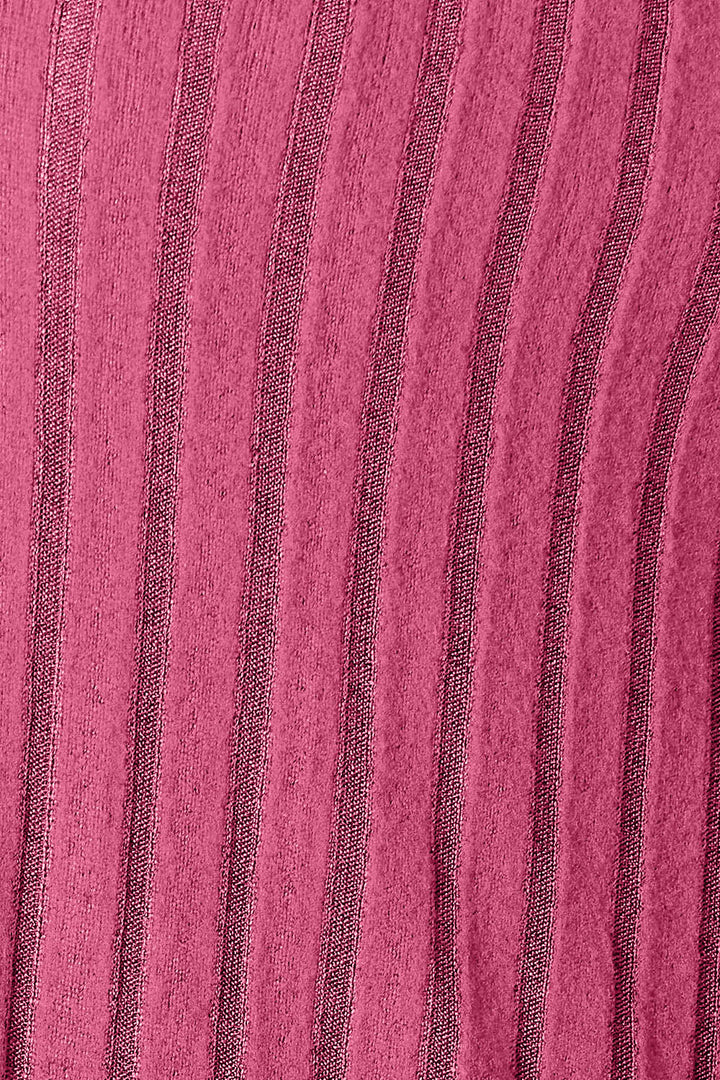 Close-up of a ribbed fabric featuring vertical dark stripes on a pink background. The knit material of the Basic Bae Full Size Ribbed Open Front Cardigan with Pockets showcases an alternating pattern that beautifully contrasts the stripes and base color, making it an ideal machine washable choice for versatility and ease.