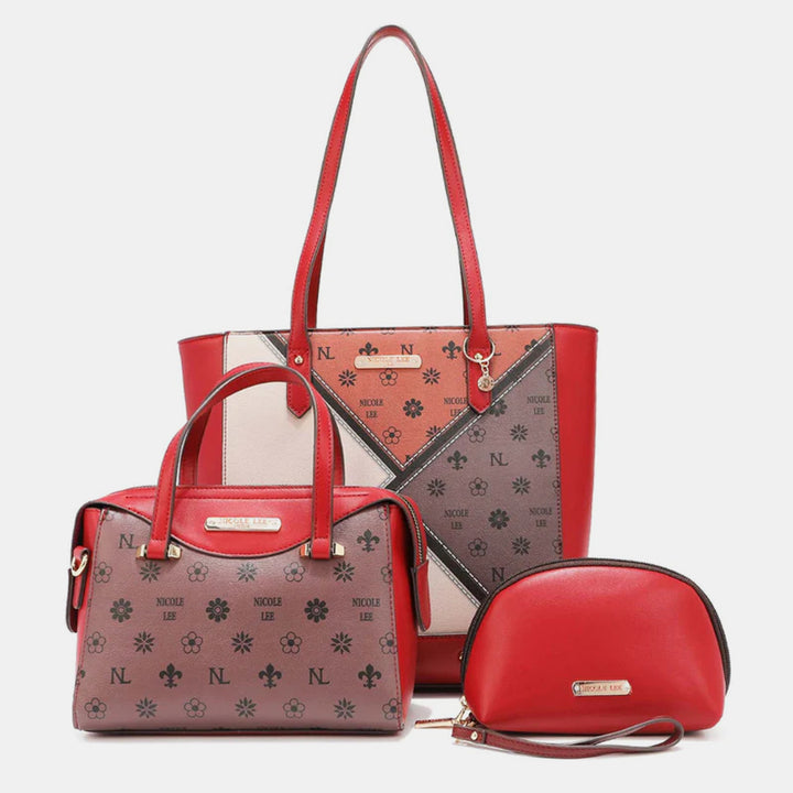 Discover the Nicole Lee USA 3-Piece Color Block Handbag Set, featuring a large red tote with multi-pattern design, a smaller brown color block handbag with red straps and floral print, and a compact red pouch. Each chic piece is crafted from premium vegan leather and adorned with the brands logo.