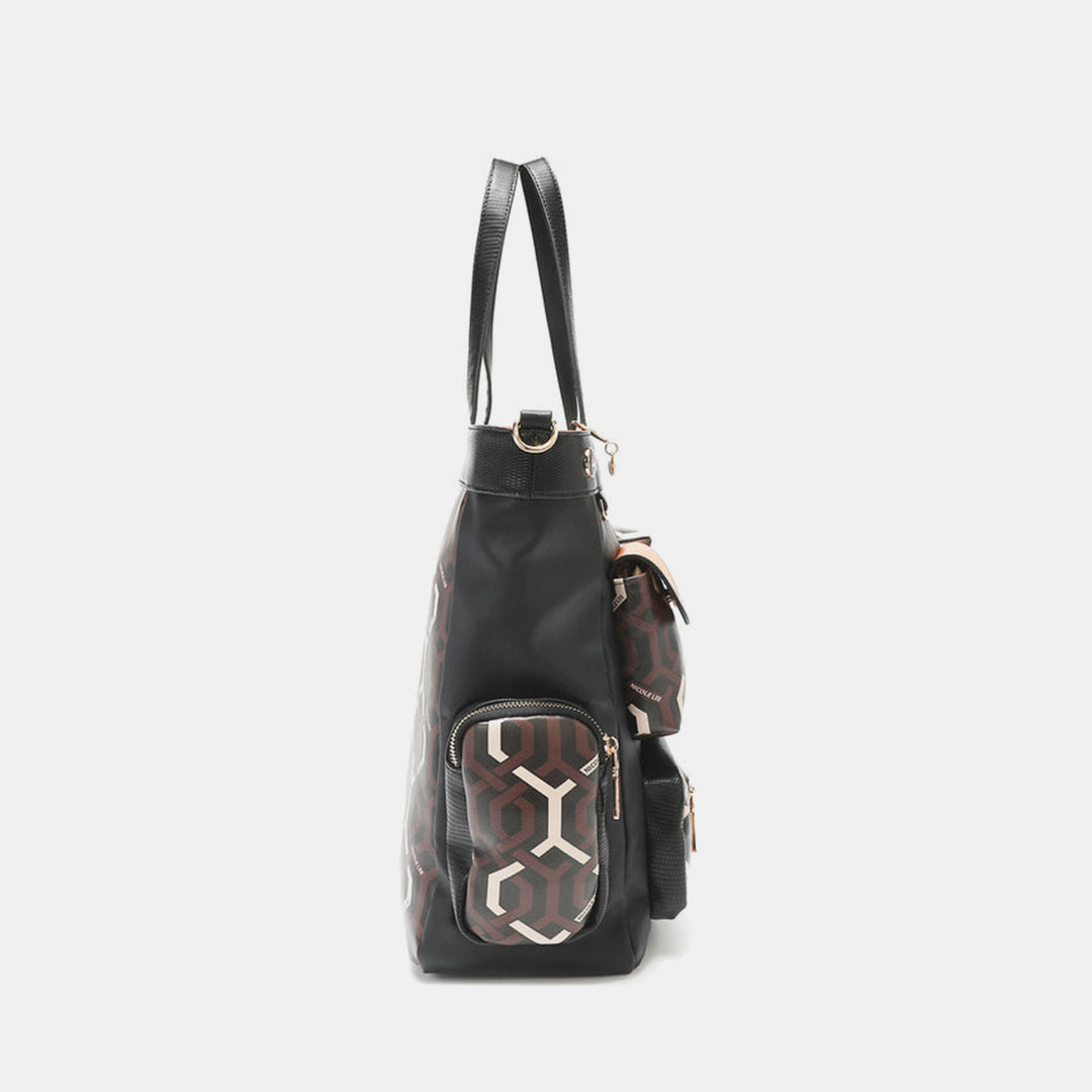 Side view of the Nicole Lee USA Geometric Pattern Tote Bag, featuring a stylish black vegan leather design with two zippered pockets, adorned with a geometric brown and white pattern, black handles, and gold-tone zippers.