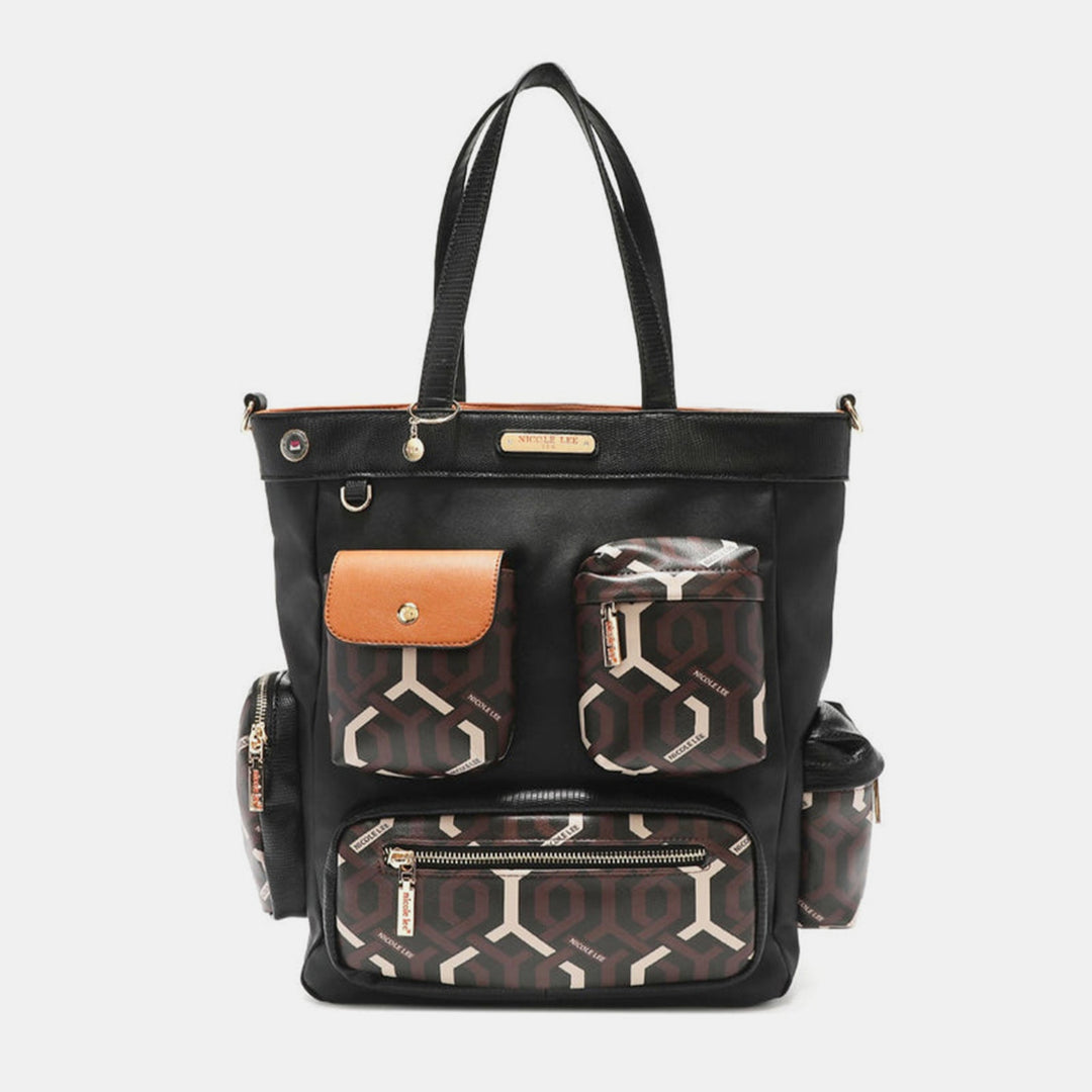 The Nicole Lee USA Geometric Pattern Tote Bag is a chic black tote crafted from vegan leather. It features multiple compartments and pockets, along with a geometric design in a neutral palette of brown, white, and black. The bag includes leather handles and a buttoned flap pocket accented in tan.