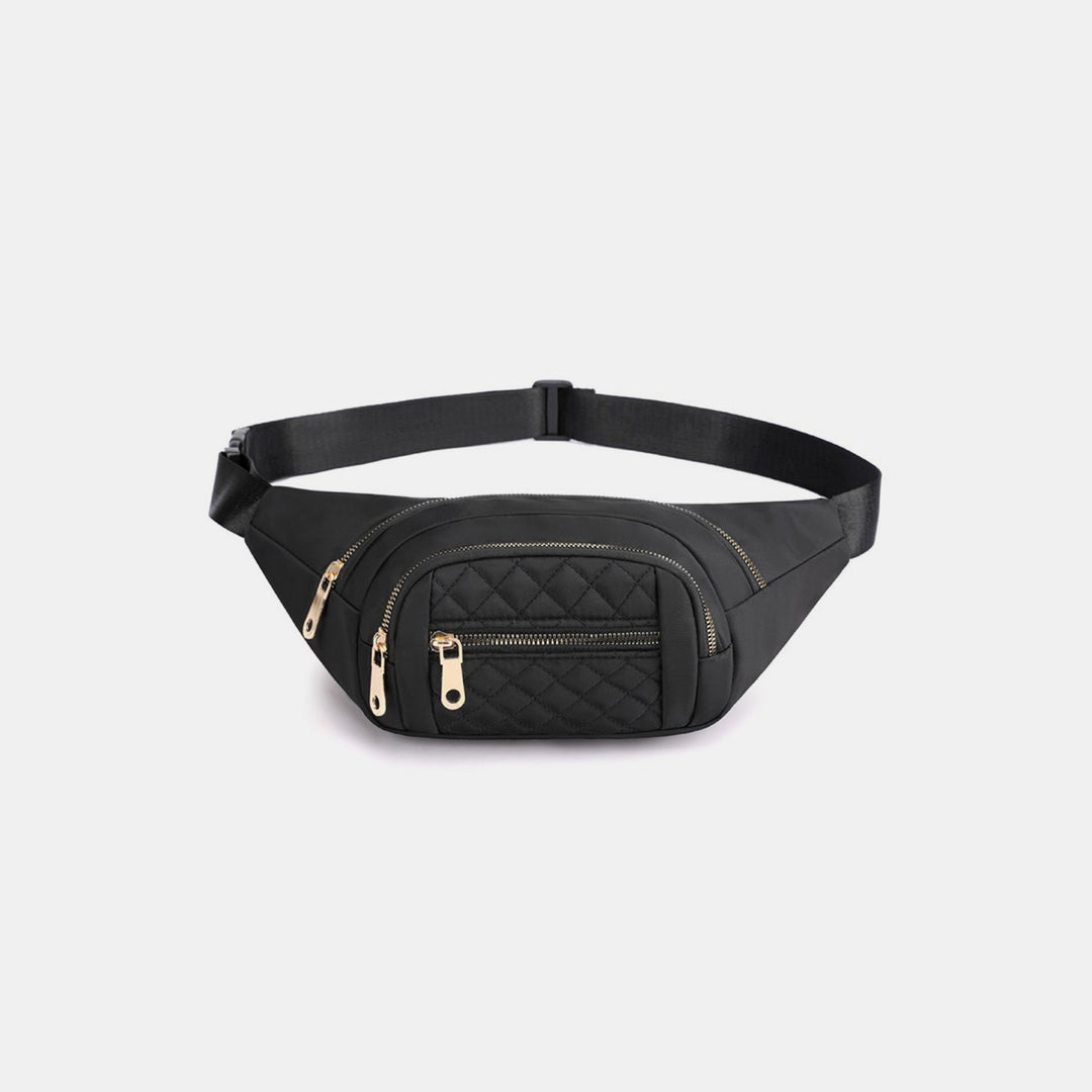 The Zenana Quilted Multi Pocket Waist Belt Bag in black showcases three zippered compartments with glossy gold zippers. It includes an adjustable black strap for convenient hands-free use and is stylishly presented on a simple white background.