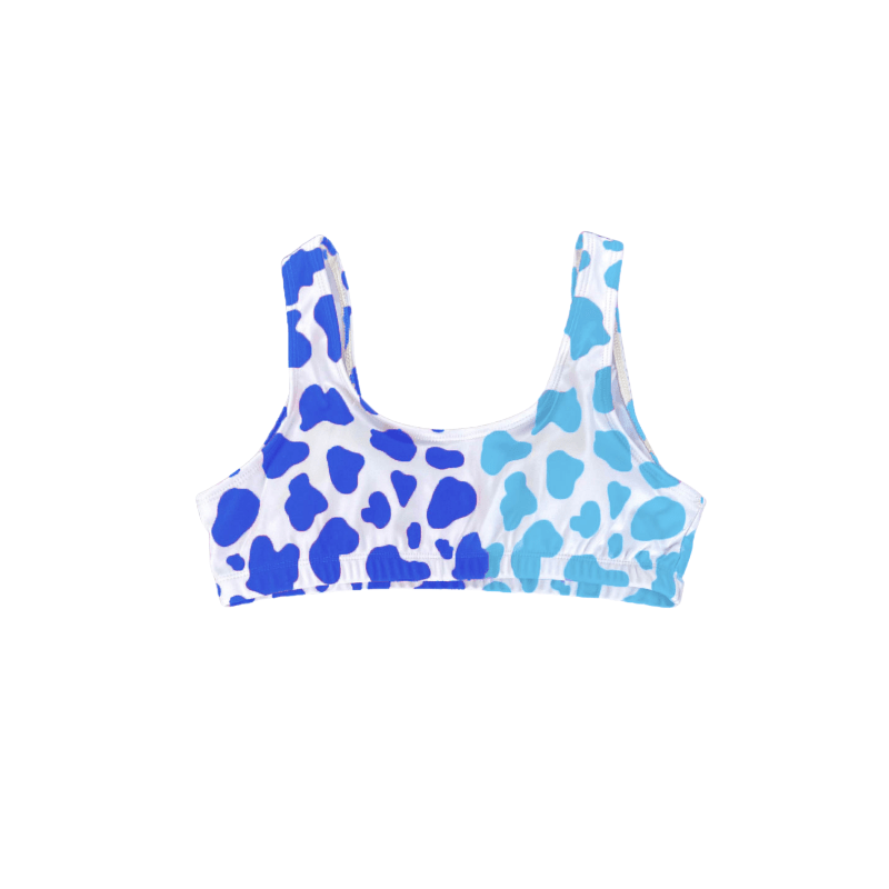 Atlantic cow print that changes colors from a darker blue to a lighter blue when temperature is applied. This is a high waisted bikini top. Kameleon Swim