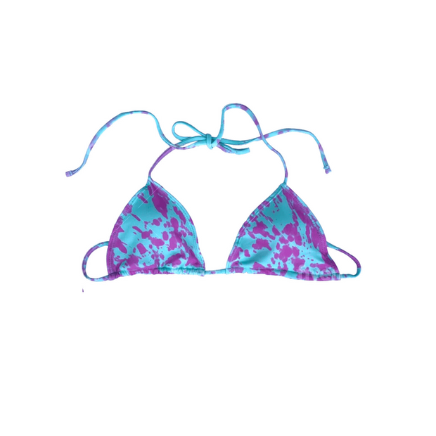 Color changing berry blast string bikini that is partially changed.  Full change of color comes with temperature changing the bikini from purple to blue when activated. Kameleon Swim