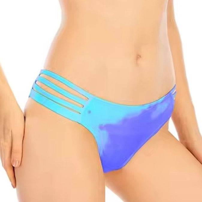 This is a up close view of the frills bikini bottom with four straps on the sides. A berry blast color that changes from purple to blue when activated. Kameleon Swim