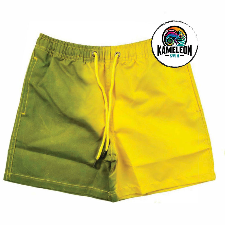 Color changing swim trunks for kids that activate when temperature changes.  This is our lemon lime shorts that change from green to lime yellow - Kameleon Swim