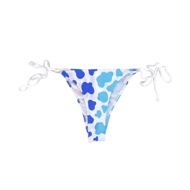 Atlantic color changing cow print string bikini bottom that goes from a darker blue to a lighter blue when heat is applied. Kameleon Swim